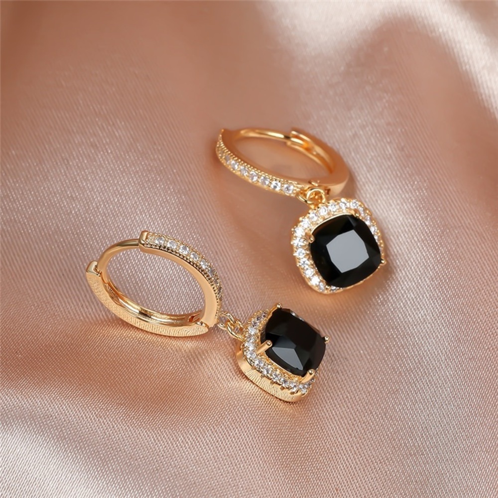 Gorgeous gold and black crystal stone drop huggie earrings